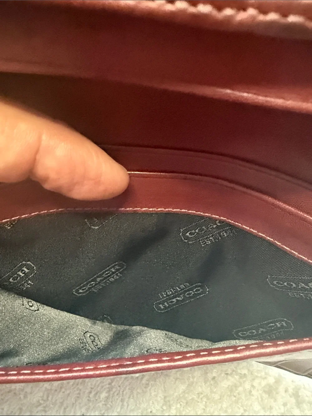 Coach Black Leather Wallet with Contrasting Stripes